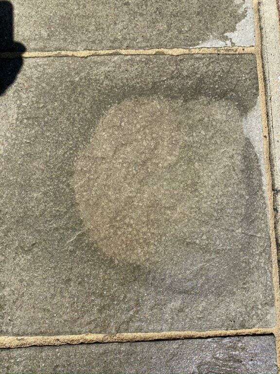 Dot and dab staining on patio slabs Cambridgeshire Art of Clean
