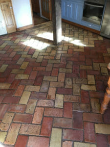 cleaning a brick floor in CB1